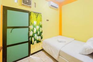 Sion Homestay Mitra RedDoorz near Terminal Kertajaya Mojokerto