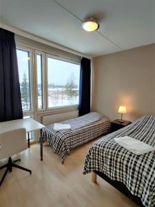 Kotimaailma - Kotoisa ja avara kolmio saunalla Tammistossa