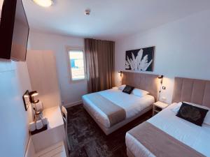 Hotels Le Passiflore : photos des chambres