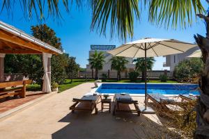 Villa Antura with private heated 50sqm pool, 3 bedrooms, 3 bathrooms, and gym