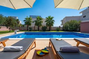 Villa Antura with private heated 50sqm pool, 3 bedrooms, 3 bathrooms, and gym