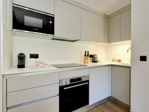 Neuf Ski aux Pieds, 3 Chambres avec WiFi et Parking - FR-1-575-189