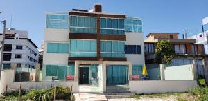 triplex beira mar de bombinhas