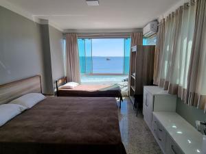 triplex beira mar de bombinhas