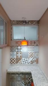 Apartamento encantador- 40 metros da praia e duas quadras do shopping