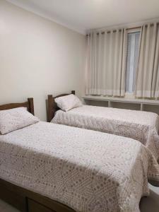 Apartamento encantador- 40 metros da praia e duas quadras do shopping