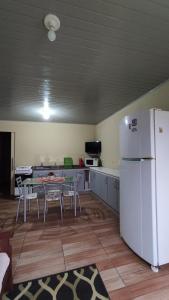 Casa completa com 2 quartos de casal em Torres