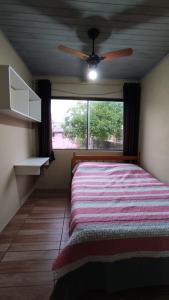 Casa completa com 2 quartos de casal em Torres