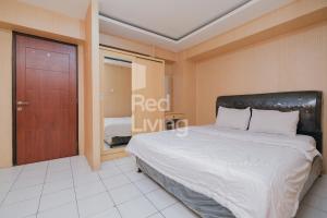 RedLiving Apartemen Kebagusan City - Niki Room