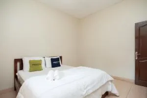 Urbanview Hotel Syariah Insani Cisarua Puncak - Brujul