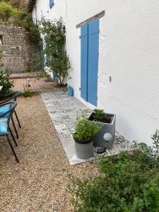 Maisons de vacances Au coeur de Charroux : photos des chambres