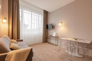 Appartements La Maison Blanche - AppartHotels climatises de charme Chic & Cosy - Centre-ville : photos des chambres