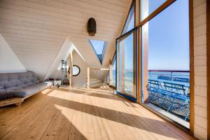 Maisons de vacances Echappee relaxante avec vue sur la mer : photos des chambres