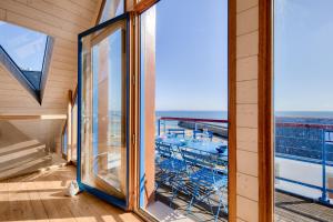 Maisons de vacances Echappee relaxante avec vue sur la mer : photos des chambres