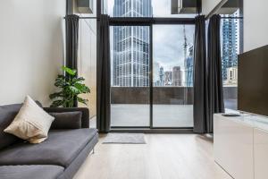 Sky-High City Luxury with Huge Deck and Shared Pool