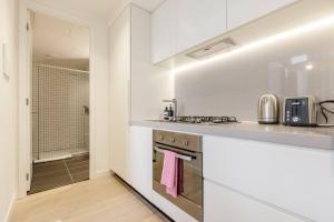 Sky-High City Luxury with Huge Deck and Shared Pool