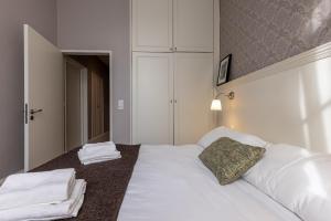 Appartements La Maison Blanche - AppartHotels de charme Chic & Cosy a 350m du coeur de ville de Limoges - Acces autonome : photos des chambres