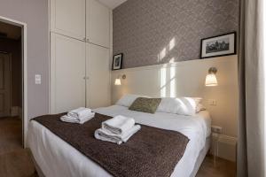 Appartements La Maison Blanche - AppartHotels climatises de charme Chic & Cosy - Centre-ville : photos des chambres