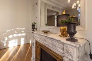 Appartements La Maison Blanche - AppartHotels de charme Chic & Cosy a 350m du coeur de ville de Limoges - Acces autonome : photos des chambres