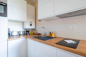 Appartements Le Nichoir de la Colline - Parking & Wifi : photos des chambres