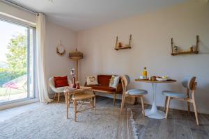 Appartements Le Nichoir de la Colline - Parking & Wifi : photos des chambres