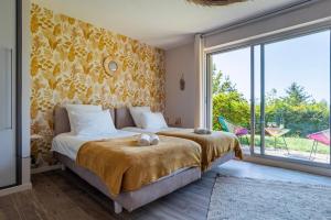 Appartements Le Nichoir de la Colline - Parking & Wifi : photos des chambres