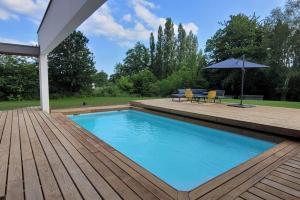 Villas Villa neuve contemporaine avec piscine : photos des chambres