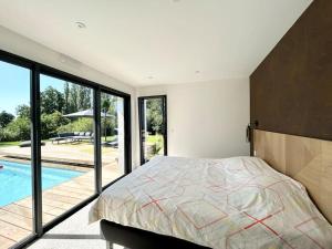 Villas Villa neuve contemporaine avec piscine : photos des chambres