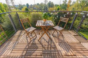 Symboliczna Apartment with Balcony & Parking Warsaw by Renters