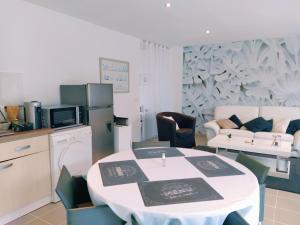 Appartements L’Ouzente, proche Dax, Jardin & Calme : photos des chambres