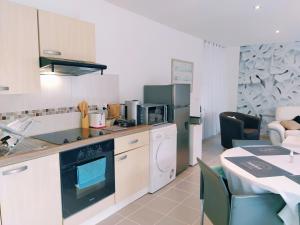 Appartements L’Ouzente, proche Dax, Jardin & Calme : photos des chambres