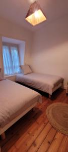 Maisons de vacances Maison de ville avec patio : photos des chambres