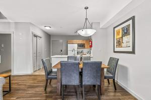 Rocky Mountain Getaway with Outdoor Heated Pool, 3 Hot Tubs, Gym, BBQ, Garage & 24 hour Reception near Banff
