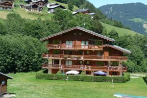 Appartements At the foot of the ski school : photos des chambres