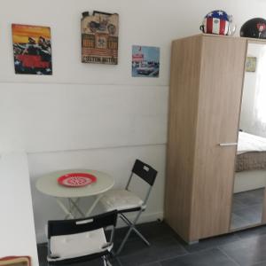 Appartements Appartement avec cour fermee pour motos ou voiture : photos des chambres