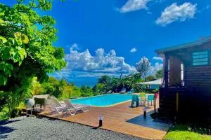 Bungalow Le Bombax - Vue mer-Plage à 5mn - Piscine - Courcelles