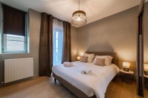 Appartements Appart DELAVIGNE spacieux classe 4 etoiles parking privatif : photos des chambres