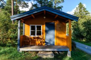 Quadruple Room with Shared Bathroom room in Korsbakken Camping