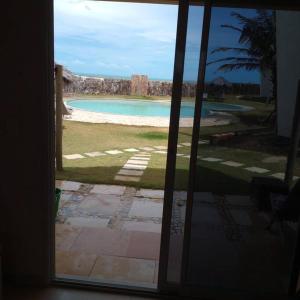 Vista do paraíso AP 09 Condomínio vilas na Praia Residente