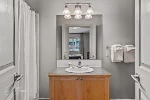 Rocky Mountain Getaway with Outdoor Heated Pool, 3 Hot Tubs, Gym, BBQ, Garage & 24 hour Reception near Banff