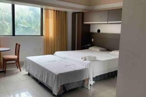 Flat em Tropical Executive Hotel