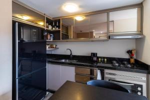 Apto a 10 min da Vila Germânica, dois quartos, salas de estar e jantar, cozinha completa, sacada com churrasqueira, Wi-Fi, Piscina, academia, mercadinho 24 horas e Vaga de garagem