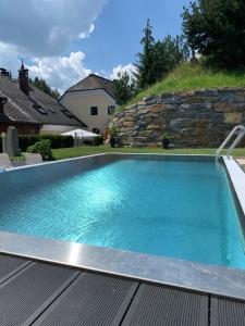 Three-Bedroom Apartment room in Ferienwelt Bogensperger