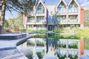 Baltic Pine Retreat WBalcony, By Cohost