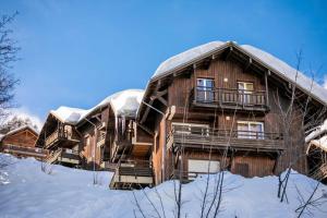 Appartements Residence Les Chalets de Puy Saint Vincent - maeva Home - Studio 2 Personnes 73 : photos des chambres