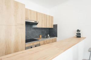 Appartements le 230 Express, Wifi, 3 minutes de la gare : photos des chambres