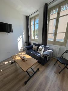 Appartements T1 Cocon proche du stade app 102 : photos des chambres