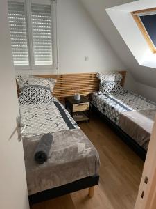 Maisons de vacances Jolie maison avec jardin : photos des chambres