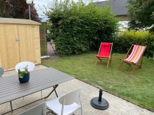 Maisons de vacances Jolie maison avec jardin : photos des chambres