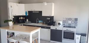 Appartements Au jardin de la seiche : photos des chambres